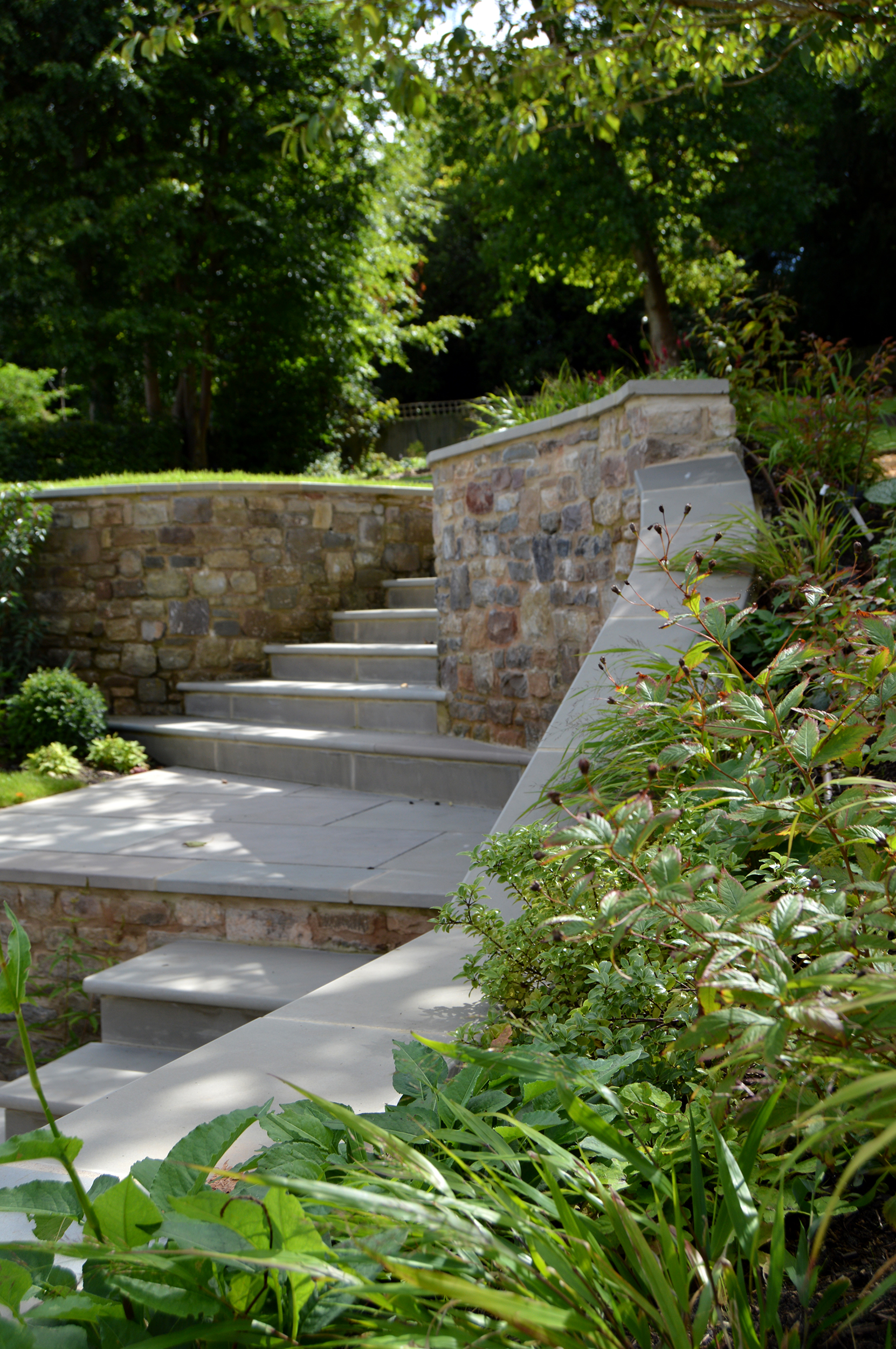 planting and sweeping stone steps