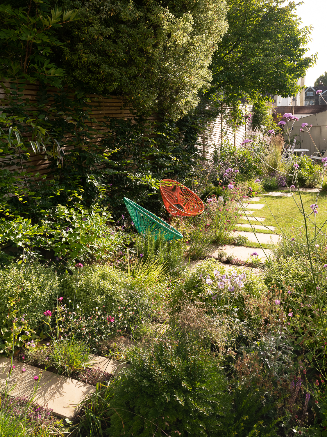 immersive planting and stepping stone path with hidden seating