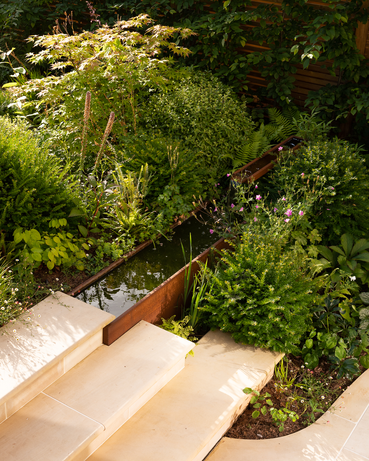 corten rill and sandstone steps