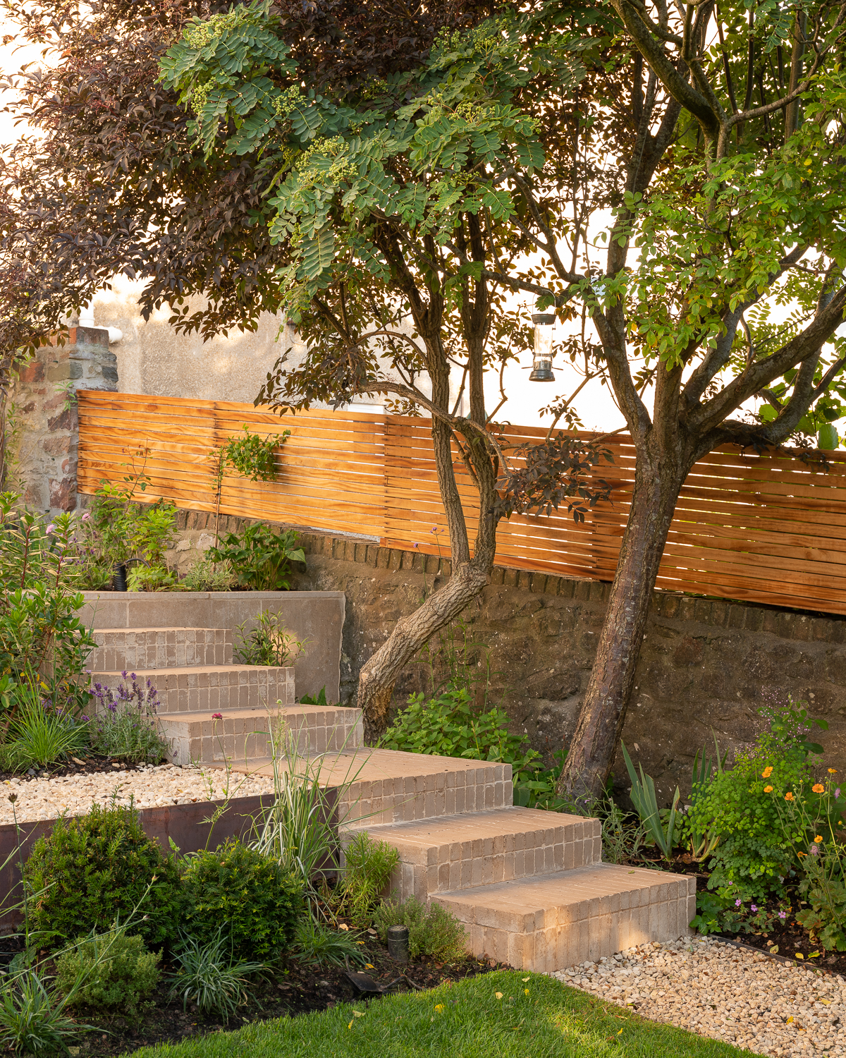 clay paver steps small terraced garden